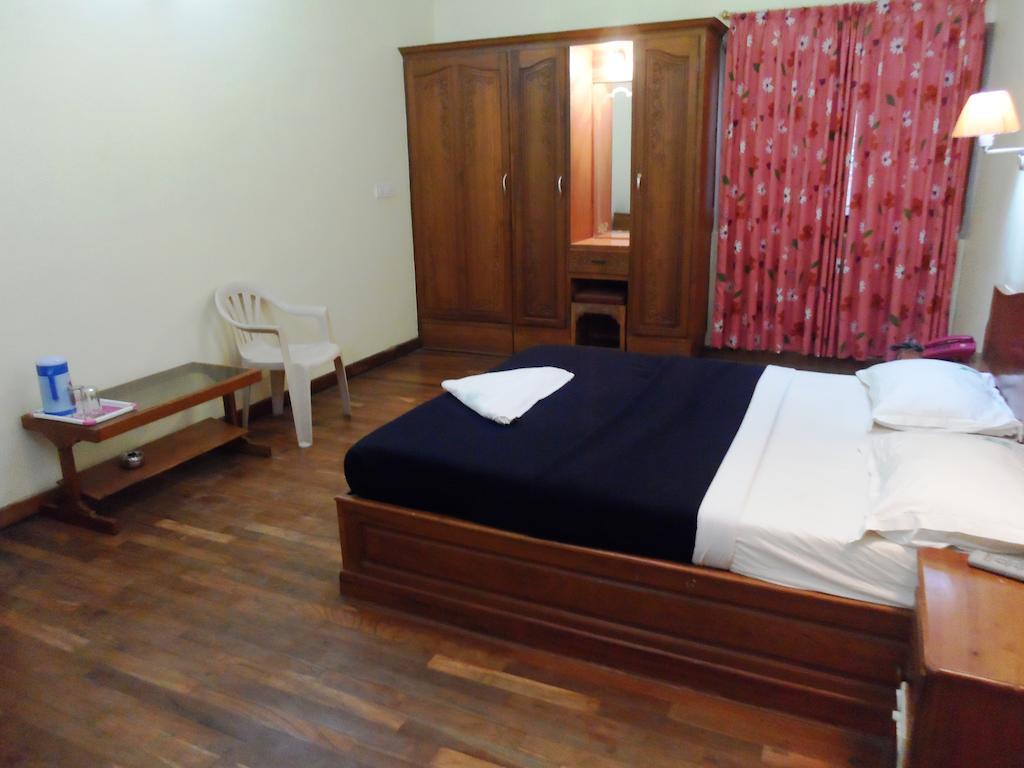 קודאיקנאל Hotel Wood Palace חדר תמונה